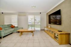  35 Coronata Dr Warnbro WA 6169 $489,000 Embrace the potential of this beautifully renovated 3-bedroom home set on a spacious 680sqm block, offering multiple living spaces and modern comforts. With unrestricted side access and room to add a pool, large workshop or a Granny Flat (STCA), the possibilities are endless. You will love the modern colour palette, renovated kitchen with soft close drawers and doors, beautiful new bathroom, 6.6kw solar electricity system, massive gabled patio with cafe blinds, hardstand at the front, plus unrestricted wide side access to a secure hardstand at the rear, ideal for storing a boat and caravan.  Just minutes from your doorstep you have access to Aqua Jetty swimming pool and gym, Warnbro Fair Shopping Centre, Warnbro Train Station, primary and secondary schools, cafes and restaurants, lush parks with playgrounds, medical facilities, and a short drive to our pristine coastlines and many family-friendly beaches, you can now have the lifestyle you have always wanted at a price you can afford. Ideally suited to a young family, savvy first home buyer, astute investor, downsizer, or FIFO/Navy workers, with room to entertain and store all the toys. Independent Rental Appraisal: in the vicinity of $550 per week. Features include: • Reverse cycle air-conditioning • Two internal living areas plus a massive outdoor entertaining area • Renovated kitchen complete with stainless steel appliances, soft close drawers and doors • King-sized master bedroom with walk-in robe and ceiling fan • Double-sized minor bedrooms, all with built-in robes and ceiling fans • Renovated main bathroom with separate shower and bath • Separate laundry with linen press and plenty of room for a washer and dryer • Massive gabled, outdoor entertaining area complete with cafe blinds • One and half-sized garage with auto roller door • Garden shed and automatic reticulation • Hardstand at the front plus secure gated access to a second hardstand • Plenty of room to add a granny flat (STCA) which could utilise the separate gated side access • Built in 1990 on a large 680sqm block of prime land Don't miss out on this fantastic opportunity, with nothing left to do but move in and the potential to add value in the future by turning it into a dual-key property! 