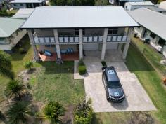  10 Ranleagh St Kurrimine Beach QLD 4871 Imagine waking up each morning in this stunning 4-bedroom high-set home in Kurrimine Beach, surrounded by top-quality fittings and finishes that will leave you in awe. The current owners have spared no expense renovating this beauty, ensuring every detail is perfectly crafted and executed. The Johnstone River hardwood timber flooring upstairs has been polished to a high gloss, adding a touch of elegance to the home. Downstairs, the flooring is tiled, providing durability and easy maintenance. The bedrooms offer ample storage space, with large built-in wardrobes ensuring that everything is neatly organized. You'll feel comfortable in your home no matter the weather, thanks to the full air-conditioning and fans located throughout. This home truly has it all, with everything you need to live a luxurious and comfortable life. The dining area is impressively expansive, comfortably accommodating a 12-person dining table. The lounge, on the other hand, provides an ultimate family entertainment experience with its spacious and inviting ambience. As you step into the modern kitchen, you will be greeted by the stunning sight of sleek granite benchtops that are not only aesthetically pleasing but also highly durable and easy to clean. The 2-pac paint on the cabinets adds a touch of sophistication to the overall design, while the soft-close and push-to-open doors ensure that you can access your kitchen tools and ingredients with ease. With twin full-sized dishwashers, cleaning up after a big meal has never been easier. And let's not forget the massive pantry, which provides ample storage space for all your culinary needs. This kitchen is a chef's dream come true, where form and function meet to create a feast for the eyes and a joy to use. On the lower level of the house, you will find a space that is just as impressive as the upper level. It boasts an open-plan rumpus room perfect for entertaining guests, whether for a game night or a movie screening. The room is large and versatile enough to also function as a teenager's retreat or a play area for children. Additionally, there is a bathroom and toilet on this level, along with a bedroom and a spacious office/workroom that can be used for a variety of purposes. This lower level provides a flexible space easily adapted to suit your needs and preferences. This magnificent property features an expansive 827 sqm block that is truly a sight to behold. Step outside, and you'll find yourself in a peaceful oasis surrounded by a fence that provides security. With plenty of space for all your toys and a large shed to store them in, you can indulge in your hobbies and interests without any restrictions. The backyard also offers ample room for a productive workspace. As you make your way to the front of the house, you'll be greeted by a stunning tiled front patio that spans the entire length of the house. This spot is the perfect place to unwind and relax after a long day, with the gentle sea breeze providing a soothing ambience. On hot summer days, you can enjoy the constant views that add to the charm of this beautiful property. Exclusively listed @ First National, inspections are by appointment only. CONTACT Ronnie: 0417 760 500 or one of his sales teams below OR Silvana Torrisi: 0438605273 OR Mo Crowley: 0427 642 015 OR Leisa Spinella: 0436 477 974 