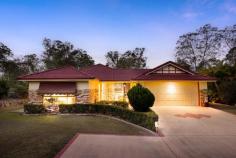  16-18 Quartz Cl Greenbank QLD 4124 $899,000 This exquisite brick and tile Hallmark built residence is nestled on a sprawling 4000m2 parcel in the tranquil Teviot Downs Estate in Greenbank. Offering 3 spacious living areas and an impressive and light-filled floor plan, this home is guaranteed to make a lasting impression. The gourmet kitchen boasts an expansive breakfast bar, quality appliances, and an abundance of storage options, catering to even the most discerning home chef. With 4 spacious bedrooms, all equipped with built-in robes and ceiling fans, your comfort is assured. The master suite is particularly striking, featuring a walk-in robe and a modern ensuite. Outside, the property includes a sizable 12m x 9m shed, dual driveways with side access, and a vast grassy area, perfect for children and pets to roam freely within a secure, fully fenced and beautifully landscaped environment. This property is conveniently located near a range of amenities, including the Greenbank Shopping Centre (featuring Woolworths and various retail stores), and it's just a short drive to local primary schools, secondary and tertiary educational facilities. Additionally, it offers easy access to the Orion Shopping Centre and the Springfield Central Train Station. Don't miss the opportunity to inspect this beautiful home at your earliest convenience. PROPERTY FEATURES: - Home is approx 18 years old - Nestled on a 4000m2 block in the Teviot Downs Estate of Greenbank - Built by Hallmark Homes - Bedrooms: 4 spacious bedrooms + BIR's + ceiling fans - Master Suite: WIR + aircon + ceiling fan + ensuite - Bathrooms: 2 contemporary bathrooms - Kitchen: Gourmet kitchen with expansive breakfast bar + quality electric cooking appliances + dishwasher + ample cupboard & pantry storage - Living Area 1: Formal lounge, carpeted - Living Area 2: Open plan family & meals, tiled - Living Area 3: Rumpus, air-conditioned with bar enclave & overhead pendant lighting - Other Property Features: Aircon + ceiling fans + separate laundry with external access to private & covered patio + linen closet + security screens + tinted windows + electric hot water system + double remote garage OUTDOOR FEATURES: - Alfresco space with gable-style colorbond roof - Extra covered patio to side of house - 12m x 9m shed (3m clearance – perfect for caravans) - Garden shed - 2 x whirly birds - Lush landscaping - Expansive front & back yard - Fully fenced - Dual driveways with side access - Biocycle system - 32,000 L + 25,000 L + 5000 L water tanks - Back-up generator - 3kW solar power - Solar gates to front of property LOCATION: - Close to a plethora of schools + shops + medical & recreational facilities - 5 mins to Greenbank State School - 13 mins to Park Ridge State High School - 4 mins to Greenbank Shopping Centre - 14 mins to Orion Springfield Central Shopping Centre - 38 mins to Brisbane CBD - 44 mins to Gold Coast.. 