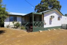  Lot 53 Reynolds Street Gibson WA 6448 $350,000 Located in Gibson, just 25km from the beautiful coast of Esperance, is where you’ll find this very neat, weatherboard and iron home. Front lounge room with big tile fire, kitchen with adjacent dining and fully enclosed games room with bar. There are 4 sizeable bedrooms and 1 bathroom. Single car garage, garden shed and rainwater tank. Relaxing front verandah outlook. 