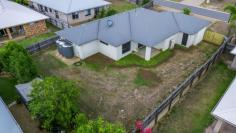  33 Iris Road Kirkwood QLD 4680 $445,000 All new carpets to be installed in this home. Installation date 12 December. You can view the home anytime. Located close to the Kirkwood Shopping Centre, this area is quiet, set off away from the busy Kirkwood highway. A family friendly area with concrete pathways around the duckpond and picnic area for walking the dog and enjoying time at the park and BBQ area. • 650m2 near level block with new double gate side access; • All windows and doors have security screens - open the doors and windows and you would rarely need to have the air conditioning on; • Ducted Air Conditioning through the entire home; • Great kitchen - large fridge space, dishwasher and electric cook top and oven; plenty of bench space and corner pantry for extra storage; the double sink overlooks the outdoor entertaining area; • Large open family and dining space with a separate formal lounge or media room; • 4 bedrooms - all this BIR's and ceiling fans; • Master bedroom - large room with ensuite and two separate BIR's, no shortage of storage and it's a large master bedroom; • The laundry is separate with storage and an outdoor clothesline from the side door; • Large auto garage with plenty of storage along the one side wall; The owners have made sure the home is presented as best they can. The garden at the front has been dressed up with new chip bark. The old broken side gate has been replaced with the strong steel frame timber panelled gate to allow good side access and security behind the gates to a decent size back yard. Some turf has been laid around the perimeter of the outdoor area as seen in the photos. A Building and Pest report is also available for the interested buyer. 