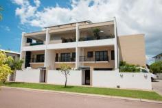  3/2 Annear Court Stuart Park NT 0820 This immaculate executive townhouse offers an enviable bayside lifestyle with plenty of contemporary luxury, set in a prime location walking distance to Tipperary Waters boat ramp, harbour and marina, and just minutes to the city. • 	 Open-plan downstairs living/dining opens to courtyard through bi-fold doors • 	 Private courtyard features paved entertaining and fenced spa with water feature • 	 Premium galley-style kitchen with granite bench tops and stainless steel appliances • 	 Second upstairs living or study area on landing at top of modern staircase • 	 Huge master bedroom features walk-in robe and luxury ensuite with spa bath • 	 Second bedroom features built-in robe and direct access to two-way main bathroom • 	 Third bedroom, also with built-in robe, shares balcony with second bedroom • 	 Immaculate upstairs two-way main bathroom, plus downstairs powder room • 	 European-style internal laundry; split-system air conditioning throughout • 	 Double lock-up garage in modern, well-maintained boutique complex • 	 You'll enjoy the best in low-maintenance modern living in this luxurious corner townhouse that combines spacious light-filled interiors with a private courtyard for easy entertaining. Enter into the generous open-plan living/dining that opens into the courtyard through stunning wall-to-wall bi-fold doors that invite the outdoors inside. The paved courtyard features plenty of room for entertaining and a fenced above-ground spa with water feature adds an extra level of luxury. The long galley-style kitchen with granite bench tops and premium stainless steel appliances including dishwasher will delight the passionate foodie, and a downstairs powder room and European-style internal laundry add convenience. A striking modern staircase leads to an upstairs landing that's ideal for use as a second living room or study area. The huge master bedroom is off the upstairs landing and opens onto a large private balcony with a bright outlook that floods the room in natural light. It also features a walk-in robe and luxury ensuite with corner spa bath and separate shower. The good-sized second and third bedrooms - both with built-in robes - share a balcony and the second bedroom features direct access into the immaculate two-way main bathroom with floor-to-ceiling tiles and shower over bath. There is split-system air conditioning throughout, and parking is for two cars in the double lock-up garage in this modern, well-maintained boutique complex. See it for yourself to appreciate its size, quality and location. 