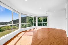  445 Petsch Creek Road Tallebudgera Valley QLD 4228 Embrace life's simple pleasures and escape to a tranquil hinterland retreat that offers serenity and seclusion. Wrapped in nature and occupying a 7.43 acre allotment, this delightful home radiates warmth and charm. Timber floors throughout enhance this cheerful ambience, complemented by fresh, light-filled interiors that are instantly welcoming. It's also designed to gaze out upon the picturesque valley views that surround it, with this spectacular outlook framed by triple bay picture windows in the formal lounge. Additionally, take advantage of the luxury of space, with a sunny living and dining area nestled next to the kitchen and a large rumpus/multi-purpose room ready to be used as your heart desires. Four generously sized bedrooms also feature, including a master suite that spoils you with a walk-in robe and stylish ensuite, while a modern main bathroom caters to the rest of the bedrooms. Outdoors, restore your senses amongst nature or relish endless fun and adventure with the kids as you explore this acreage landscape. There's also a handy 2-bay shed with drive through access plus solar panels for energy efficiency. Tucked away at the end of a peaceful and private cul-de-sac, it's just 7 minute's drive to local Ingleside State School and approx. 16 minutes to St Andrews Lutheran College. Swap the bushland for beaches in 20 minutes at Burleigh Heads, and if travel beckons, Gold Coast Airport is approx. half an hour from home. This is your chance to farewell urban chaos in favour of a life nestled in nature – arrange your inspection today. House Features: Fresh, light-filled interiors gazing upon picturesque valley views Timber floors throughout enhance its warm and welcoming charm Tastefully appointed kitchen with wooden bench tops, walk-in pantry, 4 burner electric cooktop and oven Sunny living and dining area with air-conditioning and access outdoors Oversized lounge room enriched with triple bay picture windows, framing lush hinterland vistas Large rumpus room with dual external access and laundry nook Master suite with fan, built-in robe, outdoor access and stylish ensuite with shower, vanity, and toilet Three additional bedrooms with fans and built-in robes Modern main bathroom shower, vanity, bath and separate toilet Property Features: 7.43 acre estate nestled at the end of a cul-de-sac 6m x 6m 2-bay shed with drive through access Solar panels Water tank and septic tank. 