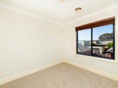  338 Anthony Rolfe Avenue Gungahlin ACT 2912 $890,000 This lovely, well-presented four-bedroom townhouse is located just walking distance to Gungahlin Town Centre and public transport. Enjoy the luxury of generous and sunny living spaces, perfect for entertaining guests or relaxing with family. The floor plan creates a seamless flow between the living, dining, and kitchen areas. The well-equipped kitchen is a culinary delight with ample storage and sleek countertops. Offering a large master bedroom and three additional bedrooms all with built-in robes. Indulge in the elegance of two bathrooms - one with a separate shower and full-sized bath, an ensuite from the master bedroom and a convenient Powder room downstairs. Step outside to your private outdoor space, perfect for al-fresco dining, gardening, or simply enjoying the fresh air. Create your own oasis. Your vehicles will find a secure home in the lockable double garage, providing convenience, security and peace of mind. Situated in the vibrant community of Gungahlin, this townhouse offers easy access to schools, parks, shopping centres, and public transport. The best of city living is at your doorstep. Property Features: - Bedrooms with built-in robes - Two bathrooms one with a separate shower and bath - Powder room downstairs - Undercover outdoor area - Secure large Double garage - Close to shopping centres, schools, parks and public transport 