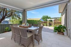  8 Seaview Street Kiama NSW 2533 This beautiful, light-filled and welcoming 5-bedroom coastal home set on a level 885sqm block in a quiet street is ideally located in the heart of Kiama. It is within close proximity to the pristine sands of Surf Beach, cafes, the train station and attractions for which Kiama is celebrated. Entertaining is a dream in this spacious quality home. It has a large open-plan design comprising the kitchen, dining area and 2 lounge areas. One lounge features a gas fire and the other can be closed off by opaque glass double doors for a perfect media/family room. The main lounge spills effortlessly through two sets of glass double doors onto an outdoor alfresco dining area which overlooks a courtyard and gardens and is equipped with wind-down screens for comfort and privacy. The impressive modern kitchen features a double Belling oven plus grill with a 900mm 5 burner gas cooktop, a generous 3 metre island bench with Bosch dishwasher and ample cupboard space. The master bedroom has an ensuite bathroom and large walk-in robe. The other 4 spacious bedrooms all have built-in wardrobes. The two oversized bathrooms have timber vanities and showers, the main bathroom featuring an attractive clawfoot bathtub. There is a very large garage with double remote-controlled doors and internal access. The property also has ample off-street parking including a special area for a boat or caravan. The home has beautiful low maintenance gardens and ample room for a private pool. Because of its superb natural beauty, beaches and friendly community feel, Kiama was rated "best town in Australia" in May 2023 by the renowned demographer Bernard Salt. If you are looking for a well located, spacious and attractive family home in this idyllic environment, one which will provide you with an enviable lifestyle with ample room to host family and friends, then this property is a must to inspect. For more information or to organise a personal inspection please don't hesitate to call Robert Moore directly on 0402 047 414 or email robert.moore@raywhite.com Key features • Immaculate, low maintenance single-storey home • Large level block: 885sqm • Quality construction with 2.7m ceilings • 5 spacious bedrooms with BIW's • Within close proximity to Surf Beach, station and Kiama attractions • Huge double lock-up garage with internal access • Charming entertainer • Beautiful gardens and grounds • Roof top solar panels.. 