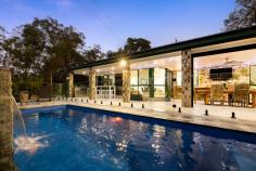  122-124 Eildon Cl Munruben QLD 4125 $1,299,000+ As you pass through the gated entrance of this property, you'll discover an expansive Henley-built single-story brick and tile home situated on a sprawling 4356m2 parcel in the serene enclave of Munruben Forest. This recently renovated residence radiates an air of sophistication, offering spacious living and entertainment areas that are perfect for hosting gatherings or simply unwinding with your loved ones. With 4 generously sized bedrooms plus a study, each thoughtfully equipped with built-in robes and ceiling fans, this home caters to your every comfort. The gourmet kitchen, recently updated, takes centre stage with its generous Caesarstone countertops, high-end cooking appliances, and an abundance of storage options, creating an ideal haven for discerning chefs. Venturing outdoors, you'll encounter an inviting alfresco space featuring epoxy flooring, heat lamps, pull-down weather-resistant shades, and a built-in BBQ-an excellent setting to entertain your friends while enjoying the scenic view of a stunning in-ground pool and expansive grounds. To enhance the allure, a variety of large sheds, carports, and storage solutions await, perfect for accommodating your cherished toys and tools. This property is an opportunity not to be missed. Explore the sheer beauty and functionality of this home at your earliest convenience. PROPERTY FEATURES: - Home is approx 26 years old - Built by Henley Homes - Nestled on a 4356m2 block in Munruben - Bedrooms: 4 spacious bedrooms + BIR's + ceiling fans - Master Suite: WIR + ceiling fan + ensuite - Bathrooms: 2 contemporary bathrooms - Kitchen: Renovated kitchen with Caesarstone benchtops + premium cooking appliances + dishwasher + walk in pantry + soft-close drawers + ample cupboard & pantry storage - Living Area 1: Formal lounge, carpeted & air-conditioned - Living Area 2: Open plan family & meals, air-conditioned - Separate formal dining room, carpeted - Study/5th bedroom, with mirrored BIR - Other Property Features: Aircon + ceiling fans + new bedroom & bathroom doors + freshly painted + block out blinds + recessed LED lighting + separate laundry with storage & external access + security screens & windows + Crimsafe security front door + Wi-Fi activated power points & light switches + security alarm & CCTV system + tinted windows + double remote garage + Fibre to the node NBN OUTDOOR FEATURES: - Covered alfresco space + epoxy flooring + sun blinds + infrared heat bars + built in BBQ - Fibreglass saltwater pool, with waterfall feature. - 9m x 9m shed with ethernet connection - 6m x 7 m shed - 6m x 7m double carport - 5.4m x 3.5m single carport - 8m x 4m farm shed - 2.5m x 6m tool shed - Epoxy coated concrete to driveway, garage, pool & alfresco space - 3 phase underground power - Lush landscaping - Gated entry - Fully fenced - Side access - 24,500L water tank - Biocycle system - Solar power LOCATION: - Close to a plethora of schools + shops + medical & recreational facilities - 8 mins to Park Ridge State School - 9 mins to Park Ridge State High School - 14 mins to Grand Plaza - 39 mins to Brisbane CBD - 41 mins to Gold Coast.. 