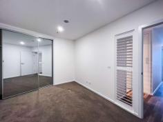  1008/2 Gribble Street Gungahlin ACT 2912 $430,000+ Imagine spending summer at a rooftop barbecue overlooking Yerrabi Pond, or completing languid laps in a 20-metre resort-style pool. Be spoilt for choice with shared amenities that also include an onsite gym when you snap up this stylish apartment in the Jade complex at Gungahlin. Flaunting stylish finishes including timber floors to the living areas and large-format tiles to the bathroom, apartment number 1008 also benefits from a generous covered balcony that has ample room for an outdoor table. The sleek central kitchen features stone benchtops, an induction cooktop, microwave niche and excellent storage, while additional storage can be found at the entry, with a full-length coat closet, and in the basement storage cage. Two generous bedrooms have built-in wardrobes and a chic, well-designed shared bathroom also boasts a European-style laundry. This well-situated and secure apartment puts you a hair's breadth from Gungahlin Town Centre with the convenience of shopping, dining and easy access to light rail. Also just a short drive to the CBD, ANU and UC, making it the ideal first home or investment property. Features include: • 	 10th floor as-new apartment in Jade complex • 	 EER of 6.0 • 	 Recently tenanted for $520pw • 	 Vacant possession available • 	 Modern kitchen with stainless-steel appliances • 	 Quality timber floors to kitchen/dining • 	 Carpet to bedrooms • 	 Covered balcony • 	 Split-system heating and cooling • 	 Stylish bathroom with face-level hidden storage and generous shower • 	 Intercom and lift access • 	 Secure basement car space • 	 Facilities include swimming pool, gym, pizza oven and BBQ area.. 