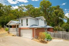  6/37 Little Yarra Road Yarra Junction VIC 3797 $680,000 - $720,000 Located in the heart of Yarra Junction, this impressive tri-level home offers a perfect blend of city style living with a wonderful country outlook. Set atop a sloping subdivision, the residence provides uninterrupted mountain views and a serene ambience to unwind in. Hardwood floors grace the living spaces, creating a warm and inviting atmosphere. The family room provides a fabulous retreat, while the open plan kitchen and dining area serve as a central space for family gatherings and entertaining. With three levels, the home offers ample room for both shared connectedness and moments of solitude. The spacious main bedroom is a great size with a walk in robe and a private ensuite. Upstairs, two additional bedrooms feature built in robes and share access to a well appointed bathroom. A versatile nook can be transformed into a study area or a teenager’s media room. Outside, two distinct spaces invite relaxation. The backyard accessible from the dining room and a tiered grassed area ready for your gardening aspirations. The double garage with internal access adds convenience to your daily routine. This property serves as a canvas for your design ideas, allowing you to create a home that is uniquely yours. Conveniently located within walking distance to local primary and secondary schools and the vibrant hub of Yarra Junction, it offers easy access to the Yarra River, Warburton Rail Trail, sporting precinct, and the diverse attractions of the Yarra Valley.  