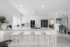 4 Seychelles Court Burleigh Waters QLD 4220 $1,949,000 Discover luxury living in this exquisite 4-bedroom, 2-bathroom, 2-car garage home with a sparkling pool. Ready now to add your personal touch and nestled in a quiet cul-de-sac in the sought-after area of Burleigh. Spanning a single level with light-filled interiors and a generous 279m2 floorplan cleverly designed for family functionality. The high ceilings enhance space and the comfortable layout flows from the foyer into multiple living areas with ducted air-conditioning throughout. Perfectly appointed for entertaining, the spacious chef's kitchen features a large breakfast bar, 60mm stone bench tops and Electrolux appliances including induction cooktop and dishwasher. Located in the prestigious Burleigh Cove neighborhood, you'll enjoy easy access to a range of amenities. From boutique shops and gourmet restaurants to pristine beaches and renowned golf courses, everything you need is just moments away. The area is also known for its excellent schools and close-knit community, making it an ideal place to raise a family. Key features * Quiet cul-de-sac in sought-after Burleigh Cove * 279m2 indoor and outdoor living spaces * Four bedrooms with built-in robes * New 3kw inverter 13 solar panels * 60mm Stone bench tops * Electrolux appliances * Daikin Ducted air throughout with ceiling fans * 2.6m Ceilings * Solar hot water * New garage door motor * Intercom * Pool * Large laundry * Water tank * Garden shed * Large epoxy floor garage with store room. * Undercover area * Landscape gardens Location: Situated in the heart of Burleigh, this residence offers not only a stunning home but also the convenience of being close to schools, parks, shopping, and dining. * 700m to Stockland Shopping Centre * 1.7km to James Street * 2.1km to Burleigh Beach * 6km to Marymount School * 2.7km to Caningeraba School 
