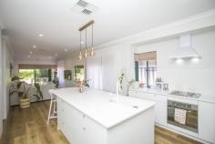  58A Tuam St Victoria Park WA 6100 $799,000 Joel Mitton from RE/MAX Real Estate has the pleasure to introduce to the Vic Park market, this stunningly renovated 3 bedroom and 2-bathroom residence located just 650m from the Albany Hwy vibrant café and restaurant strip. Every aspect of this renovation has been carefully considered and meticulously curated, allowing you to move in straight away and enjoy all that this modern masterpiece has to offer. Stepping into the main kitchen/living area you are greeted by one of the largest curved stone island benches (with built in storage) – a stunning centre piece to the designer kitchen with gold accents. To the rear of the home, the living room opens out to the covered alfresco and fully fenced spacious back yard. With generous bedrooms and an abundance of storage, this home is sure to tick all your boxes! Close enough to walk to the main café/restaurant strip, you will reap all the benefits which come with living at a location like this. In just a short stroll you can find yourself enjoying the local parks, playgrounds, schools, gyms, shops, cafes, restaurants, and bars that the area has to offer. Vic Park lifestyle just down the road! Features at a glance: – 3 bedrooms – Large, master bedroom with WIR and renovated, stylish ensuite. – 2 other large bedrooms with built in robes – Light filled second living area at the entrance to the home. – Open plan kitchen, living and dining. – Hybrid timber flooring though-out living areas. – Main bathroom with bath/shower and separate WC. – Dedicated modern laundry with access to the rear. – Low maintenance gardens and lawn with automatic reticulation. – Space for 2 cars undercover – Store room and shed – Storage everywhere you look! 