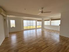  12 Tasman Court Boyne Island QLD 4680 $475,000 Welcome to 12 Tasman Court, Boyne Island! This stunning 4-bedroom, 2-bathroom house is the perfect family home. With a spacious land area of 925 sqm, there is plenty of room for everyone to enjoy. Step inside and be greeted by the modern and stylish interior. The property downstairs features tiled living with air conditioning, bar area, bathroom, shower, vanity, laundry and separate toilet, perfect for a games room. The 4th bedroom has air conditioning and carpet, pull down blinds and security screens. Internal stairs to the upstairs level you walk into the open plan living, kitchen, dining area which is so spacious and be updated throughout with the beautiful timber look lino flooring, air conditioning and a ceiling fan. Step out to the front timber verandah that is so private but also provides a light and breezy space to sit and enjoy your morning cuppa. You can enjoy the wonderful views looking over Boyne Island and small glimpses of Facing Island and the ocean. The kitchen has a 4 element gas stove, electric oven, exhaust fan, dishwasher, space for a good sized fridge, walk in pantry with plenty of space, lots of cupboard storage. As you walk down the hall way there's a linen closet, the main bathroom, a bath, shower, vanity and separate toilet. Then you will find the other 3 bedrooms with carpet flooring, built-in robes, ceiling fans, air conditioning, pull down blinds and security screens The exterior of the property is just as impressive. The fully fenced yard provides security and privacy, while the outdoor entertaining area is ideal for hosting friends and family with the outdoor pizza oven. The property boasts a 6.5kw solar system with 5kw battery, making it eco-friendly and cost-effective. There is a garden shed to the left hand side with side access meaning potential to park something small. Then there is a cement landing out the front for extra parking and a double bay covered carport. Situated in a sought-after location, this property offers the best of both worlds - a peaceful countryside feel while still being close to central location in Boyne Island. The surrounding nature and vegetation create a serene and tranquil atmosphere backing onto bushland behind. Don't miss out on the opportunity to own this beautiful property. The property is vacant and ready to move into so dont delay an inspection. With its spacious layout, modern features, and stunning location, this house is sure to impress.  