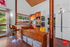  128G Friday Creek Road Upper Orara NSW 2450 $699,000 to $759,000 "Discover your personal slice of paradise! Nestled on a sprawling 2-hectare rainforest retreat, this property is a permaculture sanctuary with a babbling spring-fed creek meandering through the land, setting the stage for a tranquil and one-of-a-kind ambiance. What sets this property apart? It's not just one home; you'll have two! The main house, a charming 2-bedroom haven, boasts exquisite reclaimed timber floors, cathedral ceilings adorned with timber beams, a cozy fireplace, and a generous deck for embracing the beauty of nature. The second dwelling, a rustic-style studio, is fully self-contained, ideal for guests or generating income through Airbnb or long-term rentals. There's a wealth of resources to enjoy, from unlimited spring water, gravity-fed to your doorstep, to solar hot water in the summer and a warming fireplace with gas backup for winter, ensuring minimal utility costs. Immerse yourself in the harmonious melodies of birds and rustling trees, undisturbed by car noises. This property is a haven for rare bird and animal species, including the critically endangered Wompoo Pigeon, making it a paradise for birdwatching. Situated just 17 kilometres from Coffs, it offers convenient access to town while feeling worlds away. With bushwalks at your doorstep and hidden waterfalls scattered throughout the valley, this is a dream come true for nature lovers. Don't let this rainforest retreat slip through your fingers. Contact us today to schedule a viewing and experience the enchantment of this unique property." • Ceiling Fans • Fire Place • Solar hot water • Spring fed water tanks • Orchid • permanent spring creek 