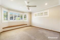  24 Bonview Street East Ballina NSW 2478 $1,050,000 - $1,150,000 Positioned to embrace the coastal lifestyle with North Creek and The Serpentine beach a leisurely 900 metre walk away this generous size home welcomes you with a large formal lounge and dining area creating an ideal space for intimate gathering and celebrations. The family room offers the charm of polished timber floors adding a touch of character to the living space whilst the heart of the home boasts a kitchen with upgraded appliances, new windows and shutters that further enhance the appeal. You are spoilt for outdoor entertaining options with the choice of both a front and rear deck for a morning coffee or cooling afternoon drink. The lower level opens up a world of possibilities with a double garage, lock up storage, dedicated work area catering for both tradespeople and hobbyists and an additional shower and toilet that adds convenience and flexibility to this versatile space. • Expansive 733m2 block with ample room for a pool • Hinterland views from the rear deck • Airconditioned family rooms • Great size lower house area that would suit tradespersons • Family swimming and fishing only 900 metres away 