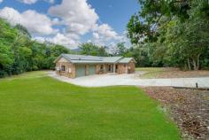  2-8 Drexl Close Gordonvale QLD 4865 $798,000 Welcome to 2-8 Drexl Road, Gordonvale .. Therese Plath is excited to present to the market for the first time in over 20 years this private acreage on 4,419m2 block. The setting is perfect … The location is first class … A fabulous hideaway only 15kms from Cairns City Centre. Welcome to your dream residence nestled on a sprawling 4,419 square meters of lush tranquillity, offering the perfect blend of spacious living and privacy. This inviting haven boasts a meticulously designed brick home, providing the ideal backdrop for a life of comfort and serenity. As you approach, the property unveils itself behind a natural curtain of trees, offering a shield of privacy that sets the stage for a tranquil retreat. The flat and expansive 4,419 square meters of land provide ample space for both relaxation and recreation, offering a canvas for your outdoor aspirations. This outstanding property stands as a testament to quality and style with parklike grounds and a coveted northerly aspect while offering wide open spaces both inside and out. Ultimate privacy and tranquility is assured where you may indulge yourself in your own little world. Situated on a large parcel of land, this solid brick home is a lifestyle concept planned around many entertaining areas. The generous and practical kitchen is ideally placed for quick meal delivery to the dining or outside to a large scale entertaining patio. Glass sliders further open the home up to cooling breezes and natural light while seamlessly transitioning out to the generous outdoor entertaining area and beyond, creating an inviting flor throughout the home. This covered patio creates multiple vantage points for taking in the expansive views while offering year round alfresco living and entertaining looking. Enjoy the peace and quiet- what a fantastic Christmas you'll enjoy here in this perfect venue. There are four bedrooms, main bedrooms serviced by the en-suite and the other three bedrooms has easy access to the family main bathroom. The exterior of the property is a haven for outdoor enthusiasts, featuring a double lock-up garage for secure parking and a shed with its own access, catering to your storage needs or providing a space for hobbies and projects. The expansive yard invites the imagination to run wild, whether you envision lush gardens, a play area for children, or perhaps even a charming outdoor entertaining space. This fully-fenced and private allotment is positioned in a sought after location. The property's prime location gives a semi-rural feel but it retains the suburban advantages of a short 5 minutes' drive to newly completed shopping centre and schools. This property is more than just a residence; it's a sanctuary where the embrace of nature meets the comfort of home. With its combination of spacious interiors, two bathrooms, and the added convenience of a double lock-up garage and shed, this acreage beckons you to experience the perfect blend of modern living and natural seclusion. Welcome to a lifestyle where every detail is designed to enhance your sense of comfort and well-being. 