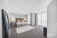  22 Moort Rise Carramar WA 6031 $1,150,000 WOW! This stunning 5-bedroom, 3-bathroom property can only be described as HUGE! Situated in the sought after ‘Wildwood Estate’ Carramar on a premium 1,539sqm block, this residence offers the space & quality that your family deserves. Features & benefits include: * Exposed aggregate driveway * Wide front verandah leading to double door entrance * Grand entry foyer with feature recessed ceiling * Huge master bedroom suite with French doors to outside, walk through fully fitted dressing room leading to deluxe ensuite with twin vanities, walk in shower, freestanding bath, floor to ceiling tiling & separate WC * Home theatre with double doors * Guest bedroom suite with ensuite * 3 further spacious bedrooms * Home office * Activity area * Open plan family & meals areas with electric effect fire * Stunning kitchen with engineered stone benchtops incorporating recessed sink, 3 ovens, dishwasher, 900mm gas cooktop, walk in pantry, double fridge recess * Scullery with stone benchtops, sink & further cabinets leading through to fitted laundry * Family bathroom with twin vanities, shower & bath * Powder room * Reverse cycle my zone air conditioning for year-round comfort * Vinyl plank flooring * Outdoor entertainment areas with polished concrete flooring * Extensive synthetic lawn for minimal maintenance * Children’s playground with inground trampoline * Full side drive though access providing plenty of parking for boat / caravan / cars & trailers * Double, remote garage * Built by Dale Alcock Homes * 392 sqm Under Main Roof * 332 sqm internal floor space excluding garage * Huge 1,539 m2 block 