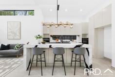  9 Harford Avenue East Hills NSW 2213 $1,739,000 Design, quality and high-end luxury - this stunning brand new architectural executive residence will absolutely impress while exclusively positioned in a boutique, leafy enclave. This high-spec sensation showcases contemporary style and features an impressive two-level floorplan highlighted by cutting-edge appointments, many creative design pieces and an easy-to-maintain level block of land. From conception to completion, this spectacular duplex has been meticulously executed to create the ultimate family escape. It is one of the finest properties to come onto the local market and promises to provide style, inspiration and an ultra-private entertainment environment that's within easy access to local schools, parks, Panania shopping village and fast train to the city and airport. - Brand new 2024 designer duplex on 378sqm of land (approx) - Breathtaking entry foyer with soaring 5 metre ceilings - 4 to 5 spacious bedrooms all with built-in robes, 2 with adjoining ensuites - Dedicated home office area overlooking the kitchen and living areas - Extensive, walk in butler's pantry with ample storage, bench space & side access - Beautiful open plan living with soaring 5 metre ceilings plus integrated fireplace - Sliding doors flowing out to the expansive outdoor entertaining area - Level back yard with built-in bbq facilities, perfect for the whole family - Ducted air conditioning throughout for year round comfort - Bonus 'Out-Building' with all necessary facilities for the extended family - Also ideal to run a small business from home - hairdresser, accountant etc - 8 minute walk to Panania Fast Train to the city & airport - Easy stroll to schools, parks + local shopping facilities - Potential rental return $1,500 to $1,700 per week 
