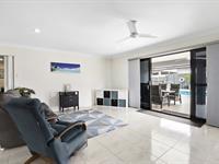  20 Bachelor Court MARIAN QLD 4753 Introducing a dream family home that offers the perfect blend of spacious living, modern elegance, and practical functionality. This immaculate four-bedroom residence is designed with the modern family in mind, offering a wealth of indoor and outdoor living spaces, providing the ultimate retreat for relaxation and entertainment. Upon entering this welcoming abode, you'll be greeted by a wide hallway that leads to an open-plan kitchen, dining, and living area, perfect for family gatherings or quiet evenings in. The main bedroom is a sanctuary of style and comfort, featuring a large walk-in robe and ensuite with a private toilet. The remaining three queen-sized bedrooms, all complete with built-in wardrobes, are carpeted throughout and all air-conditioned for comfort. At the heart of the home, you'll find a contemporary kitchen equipped with stainless steel appliances, including a dishwasher, ample cupboard and bench space, and a walk-in pantry. The generous family living area seamlessly flows onto a covered outdoor patio through sliding doors, making entertaining a breeze. For movie nights, retreat to the separate media room or a perfect private retreat for the kids. The family bathroom offers a touch of luxury with a separate shower and bath - perfect for unwinding. A separate powder room and large laundry with a third toilet ensure ample storage and practicality throughout the home. The outside is just as impressive, with a fenced 1011sqm yard boasting a high-rise 7 x 12m Shed with a hoist and 15amp power, plus an additional 6x6m Shed for extra storage. The expansive backyard is completed by a stunning pool, perfect for enjoying those long summer days. Nestled in the heart of Marian, this remarkable property is just minutes from the Marian Town Centre and a short 20-minute drive from Mackay. With an array of amenities close by, including schools and shopping precincts, and proximity to mining hubs, this small-town community offers the best of both worlds. 