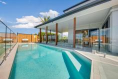 12 Trinity Place Sun Valley QLD 4680 $1,200,000 Indulge in the epitome of luxury living at our prestigious Trinity Place residence, an enclave reserved for a select few who appreciate the finer things in life. Poised on an elevated 1283m2 block, this exceptional property offers unparalleled panoramic views of our enchanting Harbour and the captivating suburban lights, creating an atmosphere of exclusivity and opulence. Spanning 369m2 under a meticulously designed roof, this two-level residence is an architectural masterpiece. The open and modern floor plan seamlessly integrates spacious living areas, showcasing the breathtaking scenery that surrounds. Every inch of this home has been carefully crafted to capture the essence of its superb location. Upon entering, you will be greeted by multiple living and entertaining spaces adorned with luxurious finishes. The magnificent kitchen, featuring white stone bench tops and 2pac cupboards, stands as the centrepiece for family gatherings, offering direct access to the outdoors and the inviting pool. The open-plan design of the kitchen, dining, and spacious living areas ensures a seamless flow while maximising the stunning views. This immaculate property boasts a separate living area on the same level, complete with plush carpeting, a fifth bedroom suitable for a teenage retreat or guest suite, a third spacious bathroom, and a lavish laundry with ample storage. Ascending to the second level reveals the Grand Master bedroom with a beautiful ensuite, walk-in robe, and, of course, unparalleled harbour views. Three additional spacious bedrooms, a third media room, and individual ducted air controls complete this luxurious retreat. The property's features are as impressive as its location, with a meticulously landscaped 1283m2 block, ducted air conditioning, split systems, ceiling fans, Crim safe, security screening, and 24 solar panels ensuring comfort and security. The kitchen is a chef's dream, equipped with white stone bench tops, 2pac kitchen, frosted glass features, gas cooktop, built-in microwave, wall oven, and dishwasher. Outdoors, a heated pool with a sand filter, three water tanks totalling 60,000 litres, and an 8x8.3m space for a boat or caravan with adjustable roller doors further enhance the property's allure. Conveniently located at the heart of the city, shopping, and schools, this residence seamlessly combines sophistication with convenience. Experience the pinnacle of prestige living as you explore the landscaped gardens, well-maintained lawns, and the large powered and insulated shed, providing additional parking for your vehicles. This property is a true testament to luxury, and we are eager to guide you through its unparalleled charm. Welcome to a life of prestige at Trinity Place - where every detail exudes excellence. 