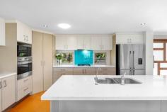  46 Highview Drive Craignish QLD 4655 $1,050,000 The ground level has been thoughtfully designed for both entertainment and relaxation. With an open plan living area and a seamless indoor/outdoor flow, it sets the stage for a supremely comfortable lifestyle. Savor the tranquil days by the pool in your private oasis, as the expansive covered decks become an entertainer's haven. The magnificent magnesium sparkling pool has been beautifully done surrounded by Italian Travertine La Perla tiles, whilst the garden is colourful and very well looked after, truly fulfilling every home owners dream. The kitchen offers some amazing storage and bench space whilst there is a huge island stone bench, mini bar area and pantry, the louvre windows look out to the pool area and features quality appliances throughout including Smeg & Omega. Bedroom two and three are perfectly positioned on the ground level and are complete with built in wardrobes, air conditioning and ceiling fans, both rooms also have fantastic lighting and breezes. The spectacular upstairs area includes a huge lounge and living area whilst the principal suite offers a tranquil bushland outlook and glimpses of the ocean from your own covered balcony and features a spacious walk-in wardrobe and stunning en-suite. The natural surroundings make it ideal for long or short-term rentals, attracting nature enthusiasts and those seeking a peaceful retreat. Features: Three bedrooms, main bedroom includes WIR, verandah access, en-suite & separate toilet Potential for a fourth bedroom Secondary upstairs lounge and living area Bedrooms two and three include Mitsubishi split level air conditioning, built in wardrobes and ceiling fans Two bathrooms in total, main bathroom includes shower and bath whilst the property includes a separate toilet and sink Kitchen with quality appliances, Smeg oven, Omega gastop, mini bar area Fantastic bench space, storage and open plan kitchen LED down lights throughout the ground level New DC ceiling fans in living areas and master bedroom Fully insulated Sloped high ceiling on upper floor Ground floor and second storey decks - 4m x 12m 6.6KW Solar power system (20 x 330x QCELL panels and Fronius inverter) Solar Ark evacuated tube hot water system - 270L 9m x 4m Magnesium mineral pool, underwater lighting, glass pool fencing The pool area is surrounded by Italian Travertine La Perla tiles - (very cool tiles even over the summer period) Aqua Nova sewage treatment plant An array of fruit trees - mango, Tahitian limes, mandarin and passionfruit Fantastic privacy, north facing and amazing coastal sea breezes Two minutes to creek which leads out to the ocean Fully fenced elevated 2082m2 allotment - no rear neighbours Rear access Plenty of room for a shed/carport Gate access from the back of the property Double garage Town water, also includes 2 x 15,000 litre rainwater tanks Located only 10 minutes to Hervey Bay The location of this home is extremely desirable with other prestige homes as your neighbours. With central Hervey Bay only a short drive, all major conveniences such as shopping centres, schools, hospitals, the airport and access to the beach and Esplanade are within an easy drive. The local beach and an array of short walks with many natural reserves, vine forests and lagoons to explore are on your doorstep. Craignish Shopping Village with pharmacy, takeaway and FoodWorks are a short 5 minutes drive for your convenience and the Craignish Golf Course and Country Club Hotel are a short 2km drive. Outside, the 2082m2 of land offers endless opportunities for gardening, playing, or simply relaxing amidst the tranquil bushland setting. This property truly provides the best of both worlds - a serene retreat and easy access to the beach. 