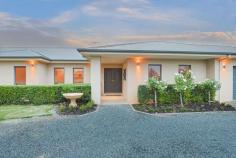  22 Modikerr Way Gol Gol NSW 2738 $1,150,000 - $1,265,000 Welcome home to one of Sunraysia's most grand residences! Surrounded by picture perfect, landscaped gardens, this impressive home of approximately 51 squares caters for the whole family. Offering four large bedrooms plus a traditional study room that could easily be utilized as a fifth bedroom, a separate theatre room with projector screen & sound proofing, formal rumpus room ideal for hosting parties, plus your usual open plan meals and living space off a large kitchen with stone benches, this home is the ultimate entertainer. The master suite at one end of the house is privately situated, designed with an abundance of walk-in robe space and a large en suite bathroom with large spa bath & more, with access to its own courtyard space.. Each bedroom offers built-in robes and as you would expect, ducted reverse cycle heating & cooling. Every room is 'oversized' and the connection between your indoor spaces to outdoor living & entertaining is seamless. A complete outdoor space under the main roof is the perfect spot to sit and enjoy the view of your immaculate gardens which have been meticulously maintained. Additionally, a 10.6 kW solar system adds to the energy efficiency of the property. This remarkable residence takes family living to new heights with multiple zones for relaxation and multiple zones for play! Storage for large toys has not been forgotten with a large 20x8 meter (approx) 5 bay shed complete with a cold water shower, toilet, vanity, and a separate sink for added convenience. The exquisite Gol Gol property is a must see and situated upon a commanding 5018m2 allotment within a tightly held location, this could very well be the dream. 