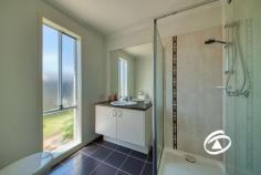  10 Windermere Blvd Pakenham VIC 3810 $700,000 - $770,000 Here's an outstanding opportunity for those seeking an excellent family residence in the highly sought-after Cardinia Lakes Estate. Positioned on a generous 576m2 allotment, this well-constructed home is situated in an elevated location and offers convenient access to a range of amenities. The accommodation features four bedrooms, with a generously sized master equipped with a walk-in robe and ensuite. The three additional bedrooms include double built-in robes and easy access to the main bathroom and a separate toilet. The open-plan main living and dining area is flooded with light, creating a spacious and inviting atmosphere. The kitchen is well-appointed, providing ample space for the household chef, with quality appliances, a gas cooktop, a dishwasher, abundant storage, and ample bench space. A second living area adds versatility to the floor plan, allowing it to be tailored to your lifestyle. Step outside to a sizable backyard, currently featuring pavement, raised garden beds, and mature lawn. Additional features include ducted heating, split system air conditioning, ceiling fans, and a remote double-car garage. Only a stone's throw away from Cardinia Lakes Shopping Complex, Eastone Reserve, walking tracks, public transport, and highly regarded Schools. 