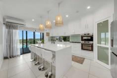  12 Trinity Place Sun Valley QLD 4680 $1,200,000 Indulge in the epitome of luxury living at our prestigious Trinity Place residence, an enclave reserved for a select few who appreciate the finer things in life. Poised on an elevated 1283m2 block, this exceptional property offers unparalleled panoramic views of our enchanting Harbour and the captivating suburban lights, creating an atmosphere of exclusivity and opulence. Spanning 369m2 under a meticulously designed roof, this two-level residence is an architectural masterpiece. The open and modern floor plan seamlessly integrates spacious living areas, showcasing the breathtaking scenery that surrounds. Every inch of this home has been carefully crafted to capture the essence of its superb location. Upon entering, you will be greeted by multiple living and entertaining spaces adorned with luxurious finishes. The magnificent kitchen, featuring white stone bench tops and 2pac cupboards, stands as the centrepiece for family gatherings, offering direct access to the outdoors and the inviting pool. The open-plan design of the kitchen, dining, and spacious living areas ensures a seamless flow while maximising the stunning views. This immaculate property boasts a separate living area on the same level, complete with plush carpeting, a fifth bedroom suitable for a teenage retreat or guest suite, a third spacious bathroom, and a lavish laundry with ample storage. Ascending to the second level reveals the Grand Master bedroom with a beautiful ensuite, walk-in robe, and, of course, unparalleled harbour views. Three additional spacious bedrooms, a third media room, and individual ducted air controls complete this luxurious retreat. The property's features are as impressive as its location, with a meticulously landscaped 1283m2 block, ducted air conditioning, split systems, ceiling fans, Crim safe, security screening, and 24 solar panels ensuring comfort and security. The kitchen is a chef's dream, equipped with white stone bench tops, 2pac kitchen, frosted glass features, gas cooktop, built-in microwave, wall oven, and dishwasher. Outdoors, a heated pool with a sand filter, three water tanks totalling 60,000 litres, and an 8x8.3m space for a boat or caravan with adjustable roller doors further enhance the property's allure. Conveniently located at the heart of the city, shopping, and schools, this residence seamlessly combines sophistication with convenience. Experience the pinnacle of prestige living as you explore the landscaped gardens, well-maintained lawns, and the large powered and insulated shed, providing additional parking for your vehicles. This property is a true testament to luxury, and we are eager to guide you through its unparalleled charm. Welcome to a life of prestige at Trinity Place - where every detail exudes excellence. 