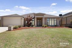  65 Spring Hill Tapping WA 6065 $700,000 This stunning 4-bedroom, 2-bathroom residence is the perfect place to call home. Buyers searching for a standout property to live in, or investors aware of the strong rental demand that Tapping offers are urged to act quickly to avoid missing out! Features & benefits include: * Contemporary front elevation with timeless good looks * Portico * Entrance hall * Master bedroom suite with large walk-in dressing room & ensuite featuring twin vanities, shower & separate WC * Home Theatre / Formal lounge * Home office with shopper’s access from the garage * Huge open plan family & meals areas with 31 course high ceilings * Kitchen with stone benchtops, pantry & stainless-steel appliances including oven, rangehood, gas cooktop & dishwasher * 3 further spacious bedrooms with built in robes * Activity area * Family bathroom with shower, bath & vanity * WC * Well-appointed laundry with sliding door linen press * Alfresco with liquid limestone & café blind * Established gardens with plenty of space for children & pets to play * Potential room for a pool * 2 x garden sheds * Ducted evaporative air conditioning * Double garage * Liquid limestone drive * 554 sqm block * Built by Dale Alcock Homes * Conveniently located across from Spring Hill Primary School * Close to many beautiful local parks, transport, shops, eateries & all local amenities 