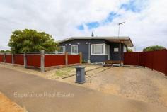  15 Tchan Street Nulsen WA 6450 $310,000 This charming 3 bedroom, 1 bathroom home is now available for with immediate possession on settlement. Situated on an 814sqm corner block, this property offers a cozy and inviting atmosphere for you to call home. The refurbished interior offers timber look flooring which flows throughout the home coupled with white wooden venetian blinds as window treatments creating a fresh and inviting interior. The large, eat-in kitchen displays gloss white cabinets, microwave recess and gas upright cooking. The interior decor is tastefully completed, creating a warm and welcoming space for you and your family. There are two revverse cycle aircons for comfort and security screens for peace of mind. The gated rear yard enjoys space for outdoor activities, caravan or boat storage with the added bonus of small shed. Conveniently located, this house is right across the road from local Primary school and just minutes to amenities such as shopping and sporting facilities. 