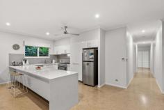 51 Nakamura Avenue Bilingurr WA 6725 $749,000 Make every day look like a holiday at this exquisite and primely located property, where resort-style living becomes your daily reality. Built in 2014, this stylish four-bedroom, two-bathroom executive residence presents like new and is the embodiment of refined living. From the moment you step inside, it's evident that every detail has been carefully considered, creating an atmosphere of class and elegance that's been maintained to an extremely high standard. Positioned mere meters away from Ibasco Park and the highly sought-after Broome North Primary School, this home offers not just convenience, but a lifestyle that's second to none. Whether you're seeking the perfect family haven or an outstanding addition to your investment portfolio, this property delivers on all fronts. From the front, the property's discreet street appeal creates a feeling of seclusion and privacy, whilst inside, the home effortlessly checks all the boxes for luxurious, modern living. Stunning polished concrete flooring sets a cool and sophisticated tone whilst the upgraded electrical switches and power points add a touch of contemporary luxury. After a long day, you'll love retreating to the spacious master bedroom that comes complete with walk-in robes. Meanwhile, the secondary bedrooms are also generous in size and all feature built-in robes for practicality and organisation. The heart of this home is its expansive open plan kitchen - boasting a breakfast bar, under-mount double sink, and top-of-the-line stainless-steel freestanding oven with gas cooktop and rangehood. The double-drawer dishwasher and soft-closing pot drawers further exemplify the attention to detail. Ceiling fans grace the kitchen and dining area, ensuring comfort while you cook and dine. The ambience is enhanced by sheer and blackout curtains that frame a three-panel stacker door, seamlessly connecting the indoor space to the alfresco area. Step outside, and the property continues to captivate., with a timber-decked outdoor alfresco entertaining zone overlooking a dazzling inground swimming pool, aglow with mesmerizing LED lighting. A custom-quality shade and lush tropical gardens provide not only shade but a serene oasis for relaxation. Practicality is not forgotten either with a generous 3m x 3m shed providing ample storage for all your tools and toys. 