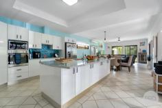  9 Wanda Avenue Salamander Bay NSW 2317 Welcome to your seaside sanctuary in Salamander Bay! Nestled quietly and perfectly positioned just 80 meters from the stunning Salamander Beach, this two-story home offers the epitome of coastal living. As you step inside, you'll be greeted by a light and bright interior design that seamlessly blends modern comfort with beachside charm. The spacious open-plan layout creates a harmonious flow, effortlessly merging the kitchen, living, and dining areas into a cohesive and inviting space. Additionally, the property features not one, but two living areas, providing versatile spaces for relaxation and entertainment. All bedrooms are strategically located upstairs, enhancing privacy and creating a dedicated sanctuary for rest and rejuvenation. The property boasts a separate study room, offering a quiet and inspiring space for work or personal projects. Enjoy the fresh sea breeze from your front balcony, providing a perfect spot for morning coffee or evening relaxation as you soak in the serene surroundings. The allure continues outdoors with a spacious and thoughtfully designed outdoor area, featuring an undercover veranda - a delightful extension of your living space, ideal for entertaining friends or simply enjoying the coastal atmosphere. The property boasts a generous garden area, allowing you to cultivate your own oasis or indulge in the beauty of the existing greenery. For those seeking a touch of luxury, an outdoor spa awaits, providing a perfect retreat after a day at the beach. Convenience is key, with an oversized drive-through garage providing ample space for vehicles, watercraft, or any other beach side essentials. To cater to your storage needs, a garden shed is also included, offering additional space for belongings, tools, or equipment. This residence is not just a home; it's a lifestyle-a chance to embrace the coastal rhythm and make every day a beach day. 