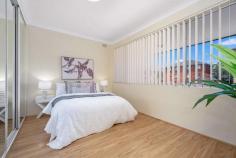  12/19 Cambridge Street Penshurst NSW 2222 Elevate your lifestyle in this well-maintained two-bedroom unit at the rear of secure building. This residence offers a seamless blend of comfortable, style and functionality, perfect for those seeking low maintenance family living. Nestled within a small security complex, it enjoys unparalleled convenience with a lock-up garage for secure parking and storage, positioned across the road from first class sporting facility (incl. an indoor cricket training centre, soccer stadium, Hurstville Leisure & Aquatic Centre and child friendly playground). Only 5 mins drive to Hurstville Westfield Shopping Centre, benefit from the M91 bus stop located in front of the building, offering service every 10 mins on weekdays. Walking distance to Penshurst Station, Hurstville Private Hospital, Penshurst Public School, facilitating effortless commuting and connectivity. This property is an ideal home. Spacious welcoming open-plan lounge and dining area flooded with natural light, seamlessly leading to a sunlit balcony, creating an inviting ambiance for relaxation and entertaining. Experience comfort with air conditioning in every season. Stylish timber floorboards throughout Updated kitchen featuring Bosch induction cooktop & electric appliances, serving hatch opening to dinning area Two generously sized bedrooms with sliding windows & built-in robes provide ample storage solutions while offering peaceful retreat for rest and rejuvenation. Well-lit bathroom with a separate bath and shower Internal laundry, complemented by an additional balcony Single lock-up garage Experience the ultimate in convenience with close proximity to shops, schools, parks, station and essential amenities, enhancing everyday living. Don't miss out on secure your slice of tranquility in this exceptional unit. Perfect for investors seeking a well-located property with high rental demand. First-time home buyers and downsizers will also find this unit a fantastic opportunity. 