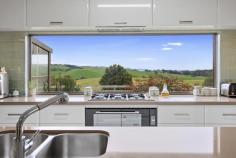  90 Toora Gunyah Rd Toora VIC 3962 $999,000 Enjoying total privacy set on approx. 5 elevated acres, yet just 5 minutes from town, this immaculately maintained property is sure to appeal. Superbly constructed with quality throughout and cleverly designed to take full advantage of the breathtaking views out over the surrounding farmland to the waters of Corner Inlet and the mountains of Wilsons Prom. An entertainer's delight with the expansive living space flowing out to join an indoor/outdoor alfresco area and covered patio with pizza oven and fire pit. Space for the largest of gatherings, centering around the superbly appointed chef's kitchen with huge stone island bench, 900mm gas hob with fan forced under bench oven, dishwasher and walk in pantry - the main feature of the kitchen being a highlight window offering amazing views. The light and bright interior features easy care tiled finishes with the luxury of under floor heating, backed up by zoned RC/AC, double glazing and the 5.5kW solar power system on a high feed-in tariff keeping running costs to a minimum. Super sized master suite with a walk in robe and ultra modern ensuite. Two further fitted bedrooms plus a private study nook. Centrally located main bathroom and large laundry with storage. The double auto garage provides direct internal access plus a 32 x 25 garage/workshop with power and concrete floor, wood shed, chicken coop, shearing shed (ideal conversion for a studio), paddock shelter and 3 fenced paddocks. Perfect for sheep, ponies, alpacas and with abundant rainfall the perfect spot for growing your own fruit trees and veggies. School bus pickup from the end of the road, just a few minutes drive to the Toora township via a sealed road. If you are seeking a country escape where all the hard work has been done, this one is a must see. 