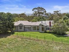  75 Arnolds Road Koonwarra VIC 3954 $1,850,000 - $1,920,000 Prepare to fall in love as you meander the curved tree-lined driveway, to discover this contemporary Victorian-style country home. Built in 2009, this quality architecturally designed home, is situated on approximately 3acres, overlooking much larger rural properties, with uninterrupted panoramic views across the Tarwin Valley, as far as Wilsons Promontory. At the end of a country lane, it is secluded, private and quiet, with abundant bird and native wildlife creating the only "noise". The family, dining & kitchen are the heart of the home. Spacious, flooded in natural light, with Tasmanian Oak timber floors, and the centerpiece Cheminées Philippe double sided wood fire set in Mount Angus Sandstone. Comprising of a country style kitchen with beautiful blackwood bench tops, quality appliances, and walk in pantry, an expansive dining space with 4m pitched roof and soaring glass picture windows, and comforting family lounge. The east wing, wrapped by the charming veranda, includes a classically styled formal lounge, and across the wide hallway you will find the master suite with spacious walk-in robe, ensuite complete with deep bath set in bay window, walk in shower, and separate toilet. The additional three queen size bedrooms are located in the west wing, each with generous built in robes, desks and spectacular views, with their own rumpus/ third living room, which has direct access to a north facing deck and is bathed in natural light. The family sized bathroom, separate powder room, & enormous laundry with direct under cover access to garage are also in this wing. Storage throughout the house is plentiful, including a custom storeroom. Established trees throughout a low maintenance garden including vegetable garden with raised beds, numerous productive apple, and citrus trees. and the tree lined driveway with ornamental Manchurian Pears providing 4 seasons of spectacular displays. Quality boundary and internal electric fencing, currently divided into 3 paddocks, which has until recently, serviced a horse and 2 companion sheep. Ideally suited to small flock of sheep and/or a horse or two. Separate 5 bay shed (18m x 7.5m) ideal storage for all your toys, boat, caravan, or horse float. 90,000L water tank storage providing ample water for the residence & property. 1500metres to the Great Southern Gippsland Rail Trail, 6mins to Meeniyan, 10mins to Leongatha, 20mins to Inverloch, and an easy 90min to SE suburbs of Melbourne. This exceptional country home is a rare gem in a magnificent location. If you have been searching for a modern, stylish country residence, then this is most worthy of your consideration. 