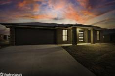  54 Longacre Road Wirlinga NSW 2640 Situated in the ever-popular and growing Wirlinga, this brand-new spacious turn-key Bridgewood family home is sure to impress! Set on a whopping 1,065m² allotment with all fencing, driveway and clothesline included. Quality constructed throughout and offering over 24.8 squares of living, this beautifully family will instantly appeal! FEATURING: – A large master suite with walk in robe and beautifully appointed, spacious ensuite. – Three additional spacious bedrooms, all with good storage. – Separate study room PLUS an additional study nook area. – High ceilings throughout and lovely timber look vinyl floors. – Spacious formal lounge to the front of the home. – Beautifully appointed and spacious kitchen with an abundance of storage, walk-through butler’s pantry & quality Westinghouse appliances including dishwasher, oven & gas cooktop. – Large open plan family room and meals area positioned adjacent to the kitchen. – Separate carpeted media room – great for family movie nights. – Modern family bathroom plus powder room. – Large laundry with good bench space and great storage. – Ducted gas heating and evaporative cooling throughout. – Lovely neutral décor, quality carpets and window coverings. – Double garage with custom oversized door and convenient internal access. With all of these fantastic features, 54 Longacre Road offers the perfect opportunity to be the first to live in this fantastic home without the stress of building! 