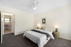  Unit 3/5 Third Ave Glenelg East SA 5045 $475,000 to $505,000 In a small tidy group of only five, this attractive unit is neat as a pin with plenty of scope for future upgrades. A fantastic location less than 2kms from the sandy shores of Glenelg, you'll find Sandison Reserve and the Helmsdale Tennis Club just over 100m from your door, and the bus, tram and Jetty Road within walking distance. Local schooling options are aplenty, and city commutes are simple. A super spacious formal living space upon entry is flooded with natural light courtesy of beautiful northerly bay windows, a split system and ceiling fan adding extra comfort. Original but with plenty of potential for upgrades, the kitchen and dining space is lined with classic monochrome tiles, with a gas cooktop and substantial storage space. Two bedrooms are serviced by the original but very neat bathroom with inset bath plus shower. The details: - Fresh carpet throughout - Ceiling fan to master bedroom - Separate laundry - Carport at rear of group Affordable and adorable with oodles of potential. Get in quick for this one. 