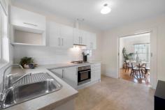  Unit 2/13 Patawalonga Frontage Glenelg North SA 5045 $665.000 to $695,000 In an immaculate group of only three, this gorgeous homette is positioned between the Pat and the beach and offers an irresistible investment opportunity or ideal starter in a wonderful location. With the beach barely 100m from your doorstep, you can also walk The Marina and Jetty Road with its cafes and coffee shops, Patawalonga park, playgrounds, public transport and with easy access to St Leonards Primary school. A large living space upon entry lined with polished timber floors and beautiful northerly-aspect bay window welcomes plenty of natural light and enjoys the comfort of a split system air conditioner. An adjacent formal dining space can be closed off from the kitchen via sliding doors if desired, where a stylish upgrade makes for most comfortable cooking quarters complete with gas cooktop, dishwasher and ample storage. Two bedrooms each enjoy built-in robes and easy access to a largely original but neat main bathroom with shower and inset bath. A privately fenced rear courtyard is dotted with established citrus and garden beds, while a separate laundry, garage + off-street parking and fresh paint throughout complete this outstanding offering in the heart of Glenelg North. Affordable and adorable, this one is the pick of the bunch along the bay, make it yours. 