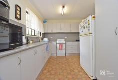  46 State Farm Rd Biloela QLD 4715 $265,000 Conveniently located in a good residential area, close to the Biloela Bowls Club and sporting fields, 46 State Farm Road really is a great choice for investors or first home buyers looking to enter the property market. This well-maintained home features an L shaped walk-through kitchen with a large pantry. Two of the three bedrooms have built in cupboards. In the spacious lounge is a lovely wood fire heater along with a split system air-conditioner plus updated ceiling fans throughout the home. The bathroom has a shower and there is a separate toilet. Additional features include smoke alarms, security screens on all windows and doors and a large laundry at the back of the home plus a ramp leading to the backyard. The yard is fully fenced with vehicle access straight through the carport. Included in the sale of this home are 2 rugs, 2 fridges, TV cabinet, Coffee table and bed. This home is classic in design and built to stand the test of time, do not miss out on this unique opportunity.  