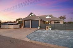  4 Alman Place HANNANS WA 6430 $749,000 Situated in a quiet cul-de-sac, close to walking bush trails, and a short drive to Hannans Boulevard and Hannans Primary School is this idyllic family retreat. With beautiful cathedral ceilings, this architecturally designed, double storey home will suit all your family’s needs. Downstairs consists of 3 good size bedrooms with built in wardrobes, plus an additional guest room/home office with separate front entrance, great for a home-based business, or when the in-laws visit! A large open plan living and dining area, with a gourmet kitchen that has plenty of storage, and an island bench for social gatherings. The main bathroom is huge, consisting of a separate bath and shower, and extra space for storage items. Upstairs is the Parents’ Retreat!! Featuring a master bedroom, walk in robe, ensuite bathroom, multi-use loft space and living space opening onto a balcony with bushland views. Imagine the sunset drinks! Step outside and enjoy a large outdoor entertaining area! Serve your guests under the large, pitched patio, with an in-built fire pit, overlooking lush, established lawns and garden beds. There is a 6x3m powered shed with additional garden shed and side access, and the kids are sorted with a cubby house, and built in trampoline! Architecturally Designed Home 5 Bedrooms 2 Bathrooms Large Open Plan Living/Dining High Cathedral Ceilings Gourmet Kitchen w Island Bench Upstairs Parents Retreat – additional living space Balcony overlooking Bushland Views Pitched Patio Entertaining Area Ducted Heating/Cooling throughout Solar panels Water pump and filter installed on mains to improve water pressure Outdoor cool room storage facility Newly replaced carpets Timber Flooring 6x3m2 Powered Shed Additional Garden Shed Double Lock up Garage 951m2 Corner Block Council Rates $2059.21 