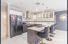  31 Mayroyd Drive Ellenbrook WA 6069 $799,000 Welcome to this lovely 5-bedroom, 2-bathroom house located at 31 Mayroyd Drive in the sought-after Charlotte’s Vineyard in Ellenbrook. Set on a huge 630 sqm block, the internal space of the home spans a massive 269 sqm, leaving a large backyard space to use any way you want to. The modern design of the house offers a lovely double door entrance opening on to a large entry, high ceilings, plenty of natural light and open living spaces, creating a warm and inviting atmosphere. There are 3 living spaces including an open dining/living area, a separate lounge and a separate theatre room, giving the family options to rest, relax and enjoy. The kitchen is perfectly positioned in the centre of the house featuring glass fronted overhead cupboards, walk in pantry, a large breakfast bench, stone bench tops and ample storage space, making it perfect for cooking and entertaining. The 5 bedrooms are generously sized, with the master bedroom featuring a walk-in wardrobe and ensuite bathroom. The additional bedrooms are perfect for a growing family or for guests. You are sure to appreciate the 6th bedroom/study that can be used as a nursery, office, library or private gym. Having a 3rd toilet is just what you need with a large home for a large family. The laundry also features has glass fronted overhead cupboards and oodles of storage space. The front window shutters will help keep the light and heat out or give you that extra peace of mind when you are off on holidays. Reverse cycle ducted air conditioning will keep you comfortable inside year-round. This spacious property boasts a double garage and extra parking spaces for a caravan, a growing family or for when friends drop over. Outside, the property offers a low-maintenance backyard, perfect for relaxing or hosting outdoor gatherings and solar panels to help keep the costs down. If you love swimming, why not put in a pool to enjoy those hot summer days. The property is conveniently located near schools, parks, and shopping centres, making it an ideal place to call home. Don’t miss out on the opportunity to own this lovely large home and mould it into your beautiful forever home, where you can build beautiful memories. INSIDE * 5 good sized bedrooms * Large walk-in pantry * 3 living spaces * High ceilings * Reverse cycle ducted air-conditioning /heating * Double Door Entry * Bamboo flooring in Theatre, Study and bedrooms * Porcelain tiles in Entry, kitchen, dining & living * 5 good sized bedrooms * 3rd toilet OUTSIDE * Roller Shutters * Featured security door on the entry * Extra Parking * Easy care gardens * Alfresco * High fences for privacy * Room for a pool LOCATION * 31 Mayroyd Drive is walking distance to parks, playgrounds and green space. * Close to the pleasurable Swan Valley for weekend enjoyment. * Easy access to major arterial roads * Close to schools, Holy Cross College, Arbor Grove Primary, Ellenbrook College * Close to the new Ellenbrook Train Station (due to open in 2024) * All this makes this an enviable location to live, rest and play. 