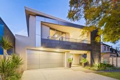  10 Ullapool Rd Applecross WA 6153 Imagine living every day like you’re on holiday in a luxurious and exclusive resort. This beautifully presented modern home presents with the highest level of specification and style with designer finishes and quality construction and it is now ready for the next lucky family to move in and enjoy. This home has been architect designed and constructed by a bespoke Italian builder for his personal family residence and is without compromise. The floor plan is cleverly designed to maximise the desirable north facing light that streams through the floor to ceiling bi fold doors into the open plan living and dining area to create a solar passive home with an 8 star Nathers energy rating. This versatile floor plan is suitable for growing families and downsizers alike. There are multiple living areas on both levels, extra large bedrooms with walk in robes that need to be seen to be believed (!) as well as a sought after ground floor bedroom suite, sumptuous bathrooms, dedicated study plus additional activity room with built in work stations, theatre room, stunning open plan dining and lounge room with gas fireplace, gourmet kitchen and even a disguised door entrance to the laundry! This home really needs to be viewed to be fully appreciated. This high quality home is designed for those seeking a spacious family home with a maintenance free lock and leave lifestyle. The grounds have been beautifully landscaped with established gardens, tranquil water features, solar heated 11 metre lap swimming pool, undercover alfresco entertaining and built in outdoor kitchen. Complete with the latest mod cons and quality you would expect in a home of this calibre, such as stone bench tops, Miele appliances, Aiphone Intercom, Perimeter Alarm System, Smart Wiring, Reverse Cycle Ducted Air Conditioning and Ducted Vacuum. There has been no expense spared with this stunning home. Conveniently located on a quiet tree lined street within this desirable riverside suburb. Stroll to Applecross Village café strip, Applecross Primary School, Gairloch Reserve, shops, cafes, restaurants, transport and the riverfront foreshore. 
