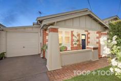  14 Bolingbroke Ave Devon Park SA 5008 Superbly situated in one of Adelaide’s fast-growing & convenient suburbs, this dazzling, three-bedroom, two-bathroom Bungalow is the perfect fit for first home buyers, investors, small families or professional couples to settle into and enjoy. Step stylishly through the leadlight surrounds of the bold front door and into the hallway boasting highly sought after c.1925 features such as sweeping timber floorboards, and high ceilings. Designed to offer a seamless flow between spaces, the floorplan allows for a comfortable living experience. All three bedrooms are generously proportioned, while two bathrooms will ensure each member of the household can experience convenience and privacy. The Troppo designed extension will bring the household together. Situated to the rear of the home, this spectacular design has been executed to a tasteful standard, encompassing ample natural light while featuring a family sized kitchen and exposed bricked walls. Seamlessly blending the out with the in, a decked outdoor entertaining and low maintenance backyard will guarantee easy entertaining. This Devon Park lifestyle offers a mix of casual elegance and a period charm that never goes out of style. This is a rare opportunity to acquire a fantastic slice of real estate, with a contemporary touch, right in the heart of this ever-popular city fringe suburb. Features to note: • Ducted air conditioning • Split system reverse cycle unit to the rear extension • Troppo Architects extension to the rear, offering an energy efficient passive solar design, to maximise the sun in winter and minimize the sun in summer • Exposed brick feature walls • Ample natural light • Electric lock up carport with two car spaces • Original floorboards • High, ornate ceilings • Built in robes to two bedrooms • Ensuite to bed 1 with retractable shower hose • Full sized bathtub with shower • Ceiling fans to all bedrooms and open plan living area • Polished concrete floors to the extension • Kitchen island bench with breakfast bar • Westinghouse gas cook top and electric oven • Dual sink • Dishwasher • Decked outdoor, undercover entertaining • Easy care gardens • Cubby/tree house with slide, included in sale • Garden shed Shopping: • 20 minute walk to Prospect Road for all amenities and more • Churchill Shopping centre, including Costco • Amenities, eateries, cafes and boutique shopping found along Prospect Road, 15 minutes walk from home Nearby Attractions/Entertainment: • Recently updated Charles Cane Reserve with new playground and exercise area • Sam Johnson Sport Ground, including Dog Play Area • HOYTS or Palace Nova movie theatre • 5-minutes to the leafy streets of North Adelaide or Bowdens Plant 3 and Plant 4 hotspots • Under 10 minutes to the bustling CBD Food & Drink: • Frankly Bagels • Cannoli Box Co. • Bombay Bicycle Club • Brewboys Brewery & Tap Room • Croydon's famous Queen Street Scene with café’s and boutique stores • Anchovy Bandit, Sunny’s shop, and Bottega Gelateria along Prospect Road Schooling: • Zoned to Brompton Primary School & Woodville High School • TAFE SA Regency Campus • Adelaide and Torrens University minutes from home • Prospect Primary, Prescott College, Blackfriars Priory, Immaculate Heart of Mary Primary, and Prospect North Primary are in close proximity distance. Transportation: • Churchill Road offering ample bus stops for your convenience • Dudley Park train station, metres away from your doorstep 