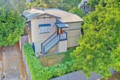  12 Goondoon Street Gladstone Central QLD 4680 $499,000 Tucked away in a quiet city laneway you will find this immaculately presented fully air-conditioned Queenslander. Combining modern features and original charm. A private location within walking distance to the best Gladstone has to offer: East Shores, the Marina and all the city conveniences. You will feel instantly welcomed upon entering through the custom built front entrance. The polished timber floors and high ceilings immediately grab your attention. Make your way through the air-conditioned light-filled living space to the quality kitchen with granite benchtops. All bedrooms feature mirrored storage, fans and air-conditioning. There is a fourth space, which could easily be used as a baby's room or city office, looking out onto the private front garden. Ideal if you work from home. The modern bathroom is well appointed. The laundry is at the rear of the home complete with second toilet facilities. Perfect for when you are entertaining family and friends out the back. The fully fenced and secure property sitting pretty on an easy maintenance 443sqm (approx) allotment. Lush lawns and gardens surround this pretty home. A free-standing double lock up garage completes the package. Charming modern Queenslander in hidden city location Air-conditioned throughout Spacious living with high ceilings and tongue and groove walls Hassle free living with no work to be done Three bedrooms PLUS fourth bedroom or office Modern kitchen with granite benchtops and ample storage Great bathroom Internal laundry with storage and second toilet Undercover modern entertainment area with second level deck Additional storage and/or workshop underneath the home Established lush gardens and fully fenced 443sqm (approx) block Private and well shaded hedged front garden Double garage is at the rear Tucked away in a private laneway away from the road Option to purchase as fully furnished 6.6khw Solar System - BONUS! 