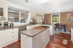  303 Haddon School Road Haddon VIC 3351 $699,000-$739,000 Nestled within a picturesque 5-acre landscape, this double brick home combines the charm of country living with modern comforts and convenience in the Haddon township, only 10 minutes from Ballarat's major shopping centre Delacombe Shopping Centre (DTC). • The home features three bedrooms, two equipped with built-in robes, while the expansive master bedroom boasts a walk-in robe and soft underfoot carpet. Outside the home also features a bungalow with cooling. • The recently updated bathroom includes a contemporary shower, spa bath, and sleek vanity with excellent white tiles throughout. • The kitchen is the beating heart of the home, featuring hardwood timber flooring, ample bench space with complimentary island, electric oven and cooktop. This well landscaped kitchen overlooks gardens and the dining area for functionality and convenience. • The living area has large windows allowing plenty of natural light and wide views of the front yard so you can keep an eye on the kids outside. • Be comfortable year-round with the split system and lovely wood fire further amplifying the country experience. • With large double bay carport and a substantial 18m x 7m shed with additional workshop area power and concrete. Perfect for any car enthusiast or handyman. • Outside the home surrounded by a veranda and features fenced paddocks, dams and landscaped gardens. Main services include septic, electricity, water and a solar system to keep the bills down. • Location- 15 minutes from the Centre of Ballarat, 80 minutes to Geelong and 90 minutes to Melbourne. This property is an exceptional find for those seeking the peace of country living without sacrificing the conveniences of close by amenities. Whether your family is looking for room to grow, a hobbyist needing ample space for projects, or someone seeking a tranquil retreat, this home caters to all. 