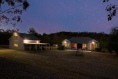  88 Quince Tree Lane Congewai NSW 2325 $1,950,000 - $2,145,000 Discover the epitome of the great Australian dream at 'Quince Cottage'. Perfectly situated on an expansive parcel of land, this beautiful home highlights a well-planned design that merges aesthetic elegance with practical functionality. Poised against the backdrop of Australia's stunning natural landscape, the home seamlessly integrates semi-rural allure with modern living on 104 acres. Located in one of the most breathtaking regions in the Hunter Valley, this captivating residence is situated only 15km from Cessnock CBD and 25km from the renowned wineries of Pokolbin and Lovedale. While being conveniently placed only a short drive from Congewai Primary School. The picturesque property combines approx 40 acres of arable flat land and fenced into 5 paddocks with 4 dams. This amazing property would suit horse enthusiasts or those just looking for a hobby farm in the beautiful Hunter Valley. The remainder is gently undulating hills filled with wildlife and natural bush - perfect for trail rides, bush walking or motor bikes. There is an extensive 5-bay colourbond machinery shed equipped with power, a sizable round yard, and another shed providing horse shelters, power, and floodlights, These horse shelters are solidly made and would also function as cattle yards or any livestock. If you enjoy country elegance, this is the home for you! A wide front verandah greets you as you walk up the stairs. You will be in awe of the high ceilings, decorative cornices, ambient lighting, and timber floorboards creating a relaxing atmosphere that transcends from room to room. The generously proportioned living spaces are augmented by ducted air conditioning and wood fireplace, the space is framed by breathtaking views of the lush green Australian countryside. An elegant kitchen takes centre stage and is tailored for culinary enthusiasts, with plenty of bench space and cupboard space, a corner pantry, a breakfast bar, and wine storage. A bi-fold window slides open to be a servery when entertaining on the stunning rear verandah, which overlooks the securely fence backyard and gives distant mountain views. Children and pets can safely play while you are at home or relaxing on the verandah. The family-friendly floorplan hosts well-appointed bedrooms with built-in robes, ceiling fans, and abundant natural light. The master suite beckons serenity, featuring a walk-in wardrobe, an ensuite, and French doors leading to a deck, offering a retreat amidst tranquil surroundings. A spacious barn-style garage boasts a loft, bathroom, kitchenette, and carport, which can be utilized as a teenage retreat or house your car collection with 6 parking bays. To complete your picture, a chook pen and fenced vegetable garden are close by. 
