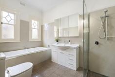  403 Mont Albert Rd Mont Albert VIC 3127 $2,400,000 - $2,640,000 Presenting established family flexibility, this superbly maintained period residence exemplifies both character and contemporary appeal within a lovely private garden setting on a generous corner allotment. The spacious and inviting home retains many original period details, including leadlight windows, ornate ceilings, and elegant formal lounge and dining rooms, both featuring open fireplaces. Flooded with natural light, an open-plan living and dining domain is centered around an oversized stone island kitchen with endless storage, all opening out to an alfresco terrace and garden that can be enjoyed for entertaining or simply relaxing. Superior accommodation comprises four bedrooms and a study/5th bedroom over two levels, including two main bedrooms with walk-in robes and ensuites. The home also boasts a fabulous upstairs lounge retreat that extends out to a veranda with serene treetop views. Features include a laundry, ducted heating, split system cooling, separate storage room, and a double garage with rear access to the garden. An unsurpassed family lifestyle opportunity awaits in one of Melbourne's most highly prized precincts, surrounded by leading local and private schools and a short stroll to Hamilton village shopping, cafes, dining, and Union Station. 