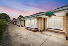  Unit 3/5 Third Ave Glenelg East SA 5045 $475,000 to $505,000 In a small tidy group of only five, this attractive unit is neat as a pin with plenty of scope for future upgrades. A fantastic location less than 2kms from the sandy shores of Glenelg, you'll find Sandison Reserve and the Helmsdale Tennis Club just over 100m from your door, and the bus, tram and Jetty Road within walking distance. Local schooling options are aplenty, and city commutes are simple. A super spacious formal living space upon entry is flooded with natural light courtesy of beautiful northerly bay windows, a split system and ceiling fan adding extra comfort. Original but with plenty of potential for upgrades, the kitchen and dining space is lined with classic monochrome tiles, with a gas cooktop and substantial storage space. Two bedrooms are serviced by the original but very neat bathroom with inset bath plus shower. The details: - Fresh carpet throughout - Ceiling fan to master bedroom - Separate laundry - Carport at rear of group Affordable and adorable with oodles of potential. Get in quick for this one. 