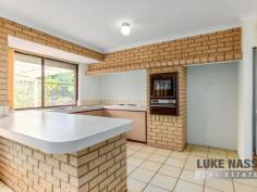  12 Cockram Rd Kelmscott WA 6111 $600,000 Welcome to 12 Cockram Road Kelmscott. Situated on a huge elevated 947m2 block, nestled away in the corner of a cul de sac this spacious family friendly 4 bedroom 2 bathroom plus study home will cater for large families or growing families looking for big bedrooms, multiple living areas and a fabulous floor plan. The backyard is a massive blank canvas at present, but let your imagination run wild as there is plenty of room for a pool, workshop and sprawling patio, with a backdrop of trees, shrubs and mother nature on your doorstep, what a fabulous place to live. The property is located in a very secluded enclave of Clifton Hills, where peace and tranquility surrounds you, but still very close to all amenities, public transport and fabulous schools for the children. Selling features include: Solid brick and tile home – Double carport with gated access to the rear – Separate formal entry – Huge lounge/TV room with meals area – Large kitchen with big fridge recess, plenty of bench space and breakfast bar – Open plan family / games area – Large master suite, easily fits a king size bed, with ensuite and walk in robe – Front study or nursery – 3 huge guest bedrooms all with built in robes – Good size family bathroom with shower and bath – Separate WC – Shade cloth pergola entertaining area – 2 garden sheds Plus more. Other selling features include: Ducted evaporative air-conditioning – Roller shutters throughout the house – Tiled flooring in thoroughfares – Brand new carpet to the lounge and master suite – Electric cooking and gas hot water system. 