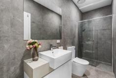  1/3 Lord Street Doncaster East VIC 3109 $950,000-$1,045,000 This newly constructed townhouse boasts four bedrooms and three bathrooms, epitomizing sophistication and top-tier qualitywith cutting-edge architectural design are located in the heart of Doncaster East and are certain to exceed your expectations and living conditions. They are very ideal because of their enormously roomy living areas, well-equipped kitchen, and highly desired location. Features include: Ground Floor: Spacious open-plan living and dining area leading to an airy east-facing terrace with tri-slide doors Stunning stone kitchen with a convenient window servery to the outdoor dining area, equipped with stainless steel appliances such as oven, 5-burner gas stove, and dishwasher, complemented by a mirrored splash-back Guest suite or secondary master bedroom with a fully-tiled ensuite and walk-in wardrobe Fully-tiled ensuite with a stone vanity, spacious frameless glass walk-in shower, and toilet Basement: Flexible space suitable for a gym, cellar, or storage room Separate laundry with stone benches, ample storage, and provision for a front loader washing machine Oversized double automatic garage with shelving and internal access First Floor: Two additional double bedrooms Impressive fully-tiled main family bathroom Expansive master bedroom with a fully-tiled ensuite, built-in wardrobe Additional Features: Zone ducted heating and reverse cycle ducted air conditioning Video intercom system Security alarm Elegant American Oak flooring and plush carpets Sleek tri-level design with high ceilings Situated in the sought-after school zones of Doncaster Gardens Primary School and Doncaster Secondary College, this property is conveniently located behind Jackson Court Shopping Centre, with easy access to Saints Peter & Paul's Primary School, parks, Devon Plaza, and bus routes to Westfield Doncaster and the city. 