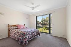  5 Noel Road Langwarrin VIC 3910 $650,000 - $699,000 Revelling in lifestyle ease so close to parks, playgrounds, shops, recreational facilities and Langwarrin Park Primary School, all just a short walk away, this sundrenched single-storey home unites space, comfort and affordability in a wonderfully family-focused enclave. With a north-facing aspect maximising the natural light, the residence boasts two interconnecting living zones with plush waffle carpeting supplying comfortable dimensions for couples and families alike. A sleek kitchen with breakfast peninsula, stainless-steel oven and a glass ceramic cooktop is well-placed in the heart, while glass doors flanking the family room glide open to covered verandah and easy-care fully fenced garden, which provides an idyllic setting for outdoor hosting and weekend unwinding. Residents will enjoy the comfort and convenience in the master bedroom with a walk-in robe and ensuite-style access directly to the bathroom, while a separate WC, two additional bedrooms, ceiling fans and a double garage are among the inclusions. Secure within the coveted Elisabeth Murdoch College zone and just 400 metres to the primary school and around 10-minutes' walk to both Langwarrin Plaza and the major shopping of The Gateway, the property is just a few minutes' zip to the freeway onramp for an easy commute into Melbourne. 