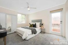  Unit 4/65 Parkview Rd Russell Lea NSW 2046 Framed by leafy gardens, this first floor apartment offers a peaceful and relaxed lifestyle in a parkside location. Set in a secluded position in a small secure complex opposite Russell Lea's Campbell Park, the oversized home delivers spacious interiors and the bonus of two private balconies. Enjoying natural airflow and an abundance of light, the low-maintenance layout features a large combined living and dining area, separate full-sized kitchen, and huge internal laundry. Recently refreshed with new carpet and paintwork, the move-in-ready home also has potential for further upgrades in the future. Conveniently located for nearby amenities, the property is only 300m to the waterfront, 260m to CBD bus routes, and 750m to Wareemba Village cafes and retail. • Two-bedroom apartment in boutique complex opposite Campbell Park • Spacious open-plan living and dining flowing to balcony with garden outlook • Modern electric kitchen featuring integrated oven, and dishwasher • Generously sized master bedroom with built-in robe and private balcony • Large guest bedroom includes mirrored built-in robe • Contemporary bathroom features shower, vanity, and plenty of storage • Huge internal laundry with space for separate dryer and washer • Freshly painted. New carpeting • Single space lock-up garage 